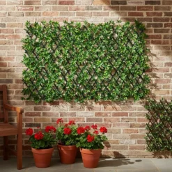 Siepe Artificiale Estensibile con foglie di Schefflera Verde h28x280 cm